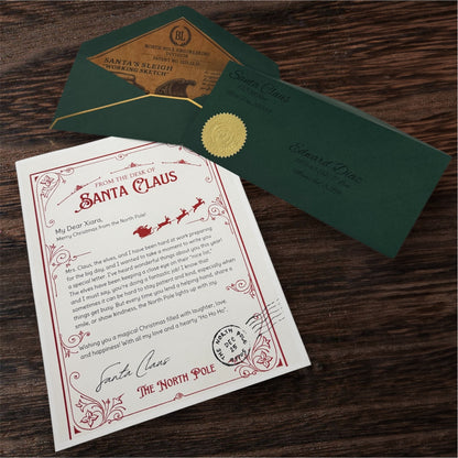 Santa’s Custom Letters with Reindeer with green envelope and gold seal.